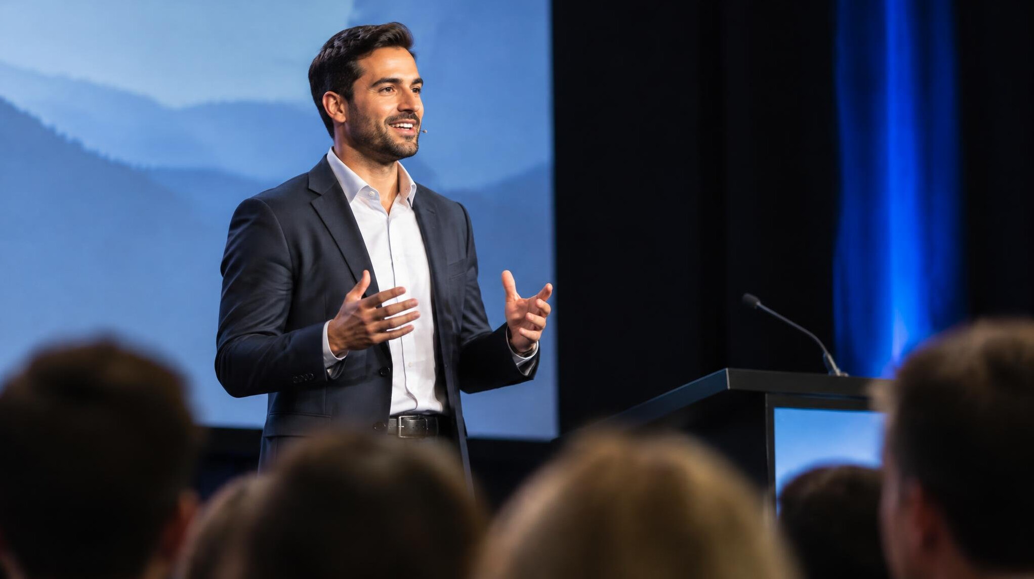 confident speaker on stage
