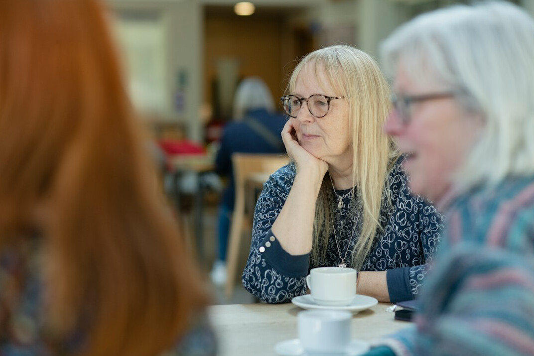 person listening attentively to friend